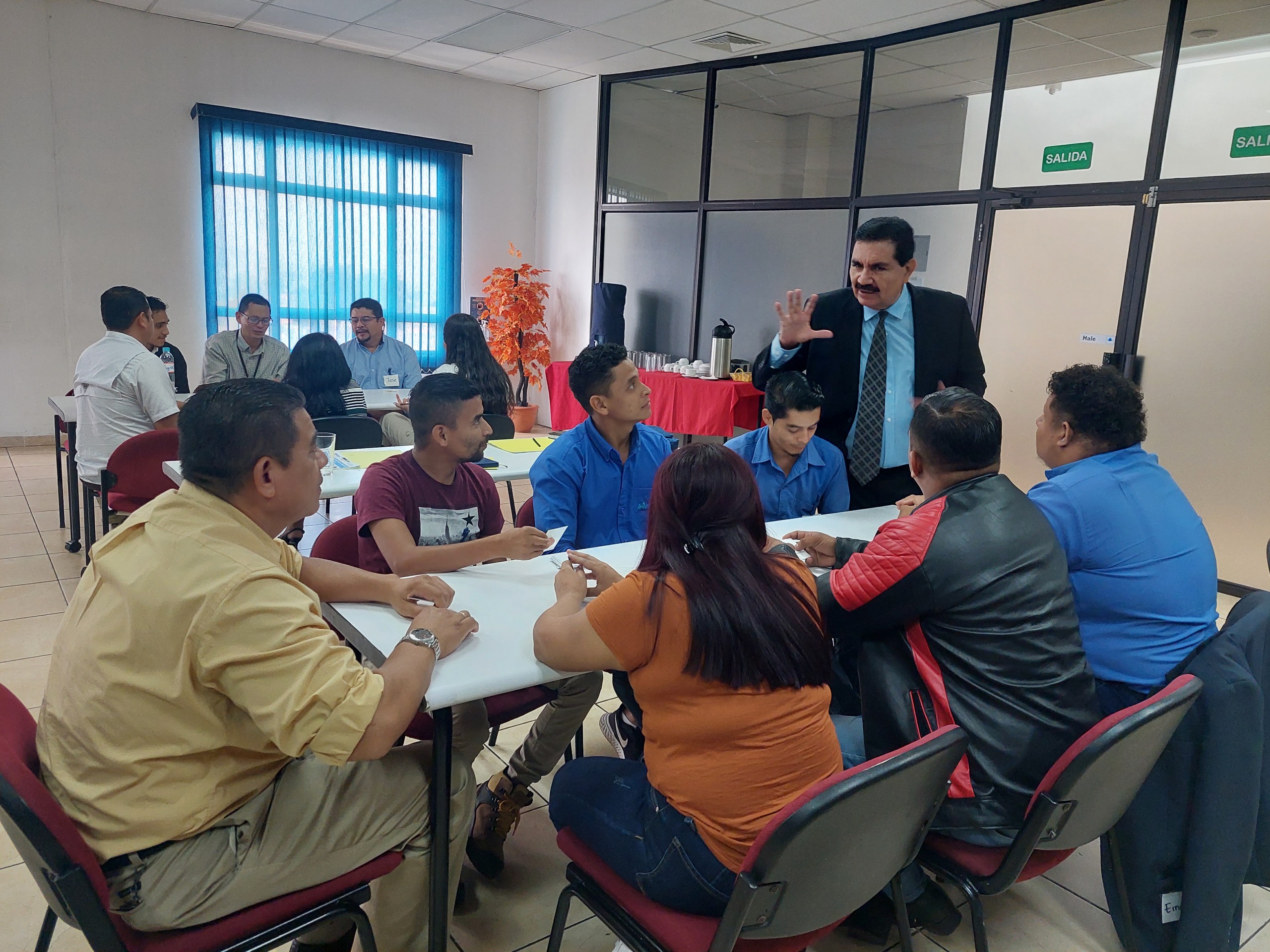 Alfredo Caballero facilitation a workshop roundtable